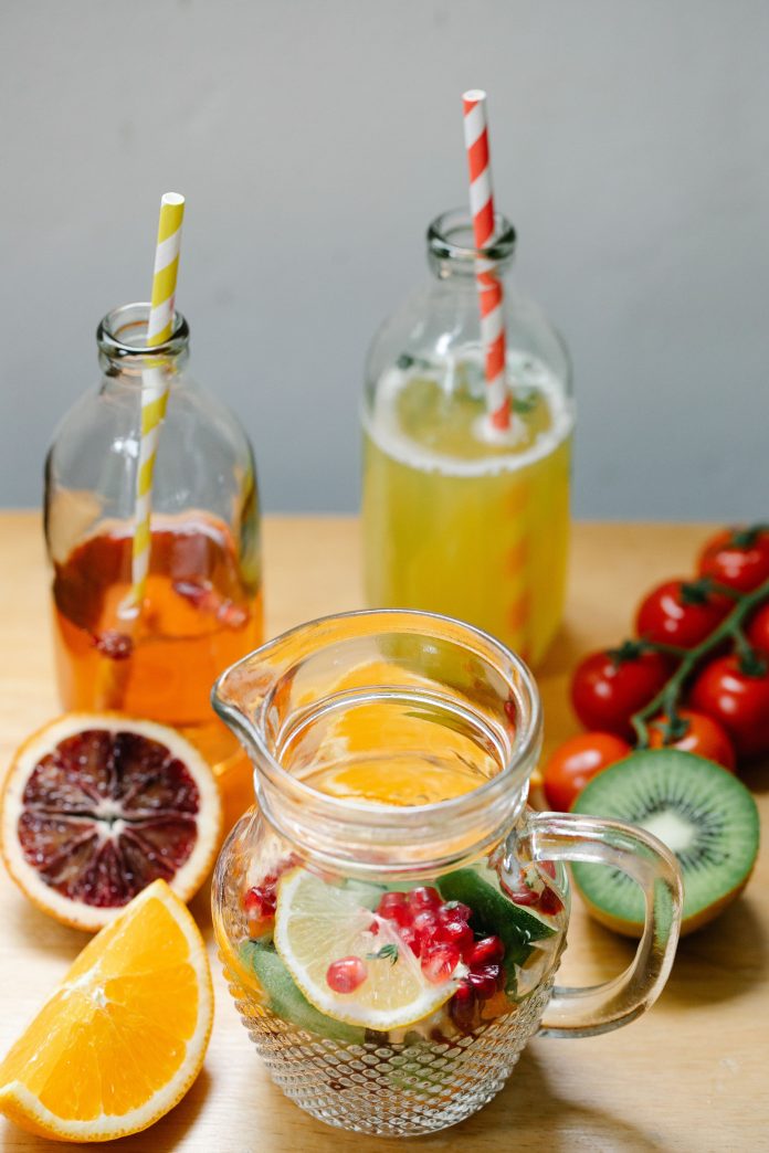Healthy drinks including infused water, fruit smoothies, herbal tea and coffee with fresh fruits and mint