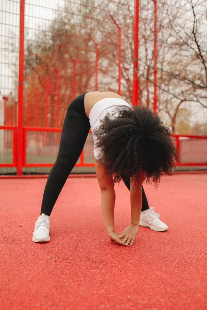 Woman stretching to improve mobility and flexibility during exercise