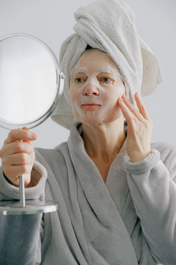 Woman relaxing at home as part of a self-care routine