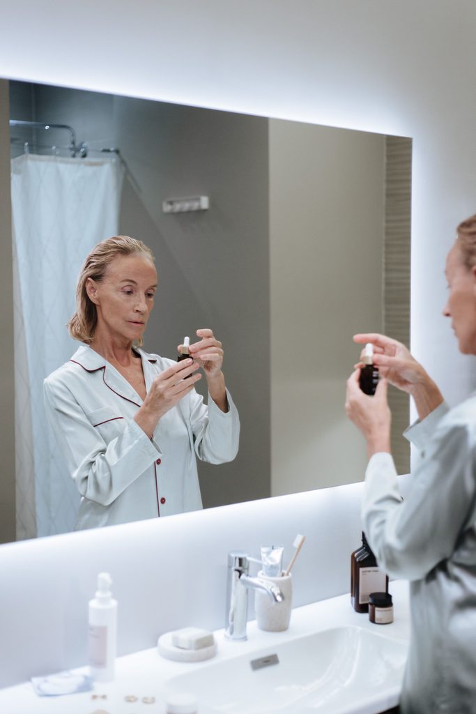 Woman practicing self-care during a personal care routine